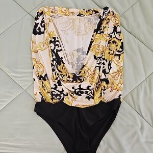 Elegant Gold and Black Bodysuit